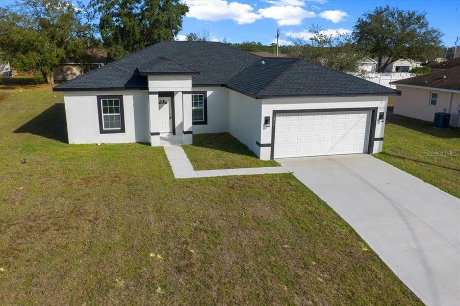 Front exterior of a new home in , Ocala, FL, highlighting curb appeal (Image 31).