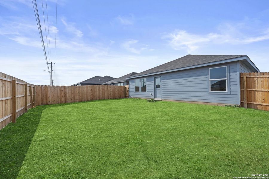 Exterior details and patio area of a home in Voss Farms, New Braunfels (Image 2).