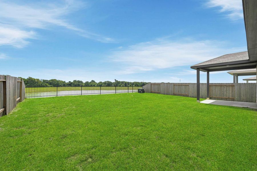 Exterior details and patio area of a home in Paloma at Sanford Farms, Waller (Image 4).