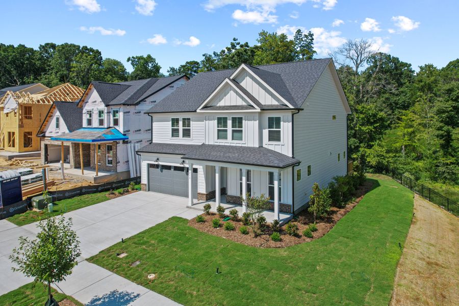Front exterior of a new home in Elmbrook, Indian Trail, NC, highlighting curb appeal (Image 1). Front exterior of a new home in Elmbrook, Indian Trail, NC, highlighting curb appeal (Image 1).