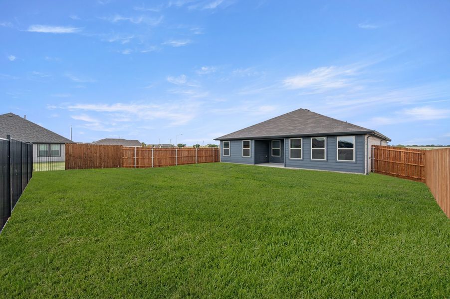 Front exterior of a new home in Terra Vella, Haslet, TX, highlighting curb appeal (Image 26). Front exterior of a new home in Terra Vella, Haslet, TX, highlighting curb appeal (Image 26).