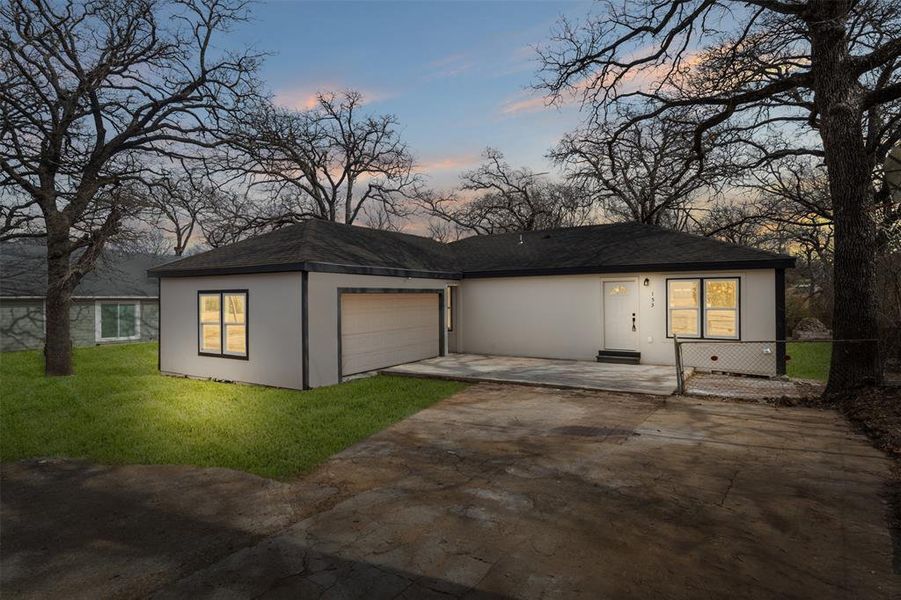Front exterior of a new home in , Azle, TX, highlighting curb appeal (Image 17).