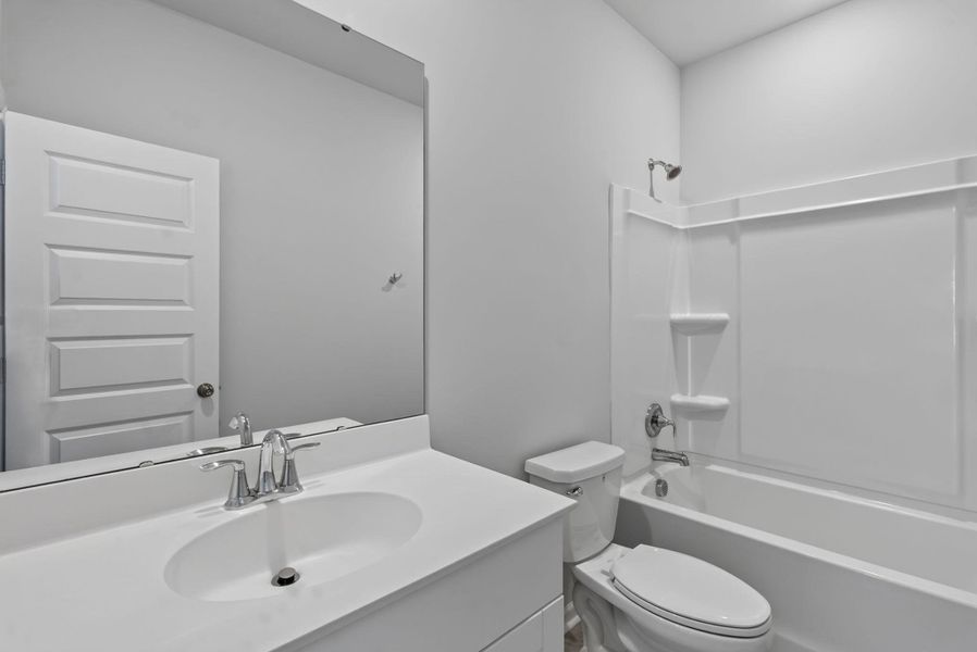 Furnished interior view inside a new home in Sweetgrass at Summers Corner, Summerville (Image 36).
