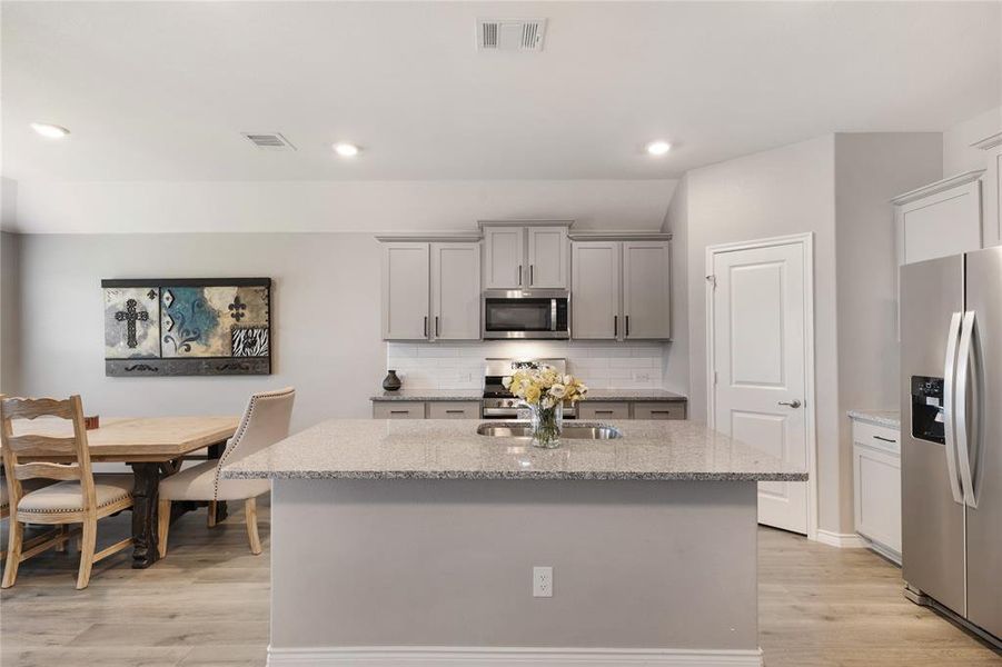 Furnished interior view inside a new home in , Aubrey (Image 13).