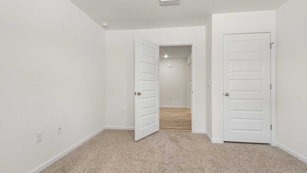 Spacious, unfurnished interior of a new home in Ashton Park Phase III, Freeport (Image 18).