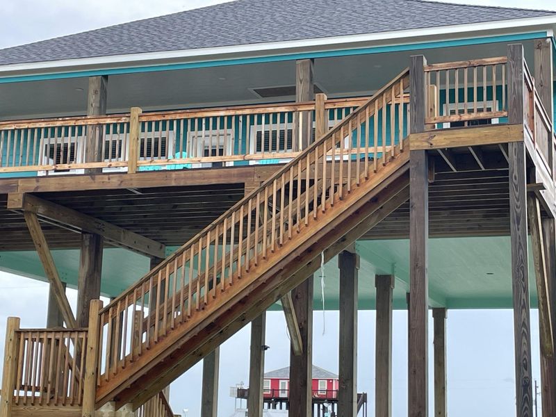 Front exterior of a new home in , Bolivar Peninsula, TX, highlighting curb appeal (Image 2). Front exterior of a new home in , Bolivar Peninsula, TX, highlighting curb appeal (Image 2).