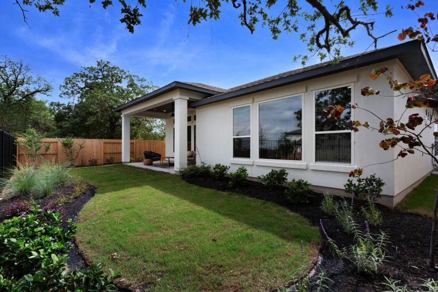 Exterior details and patio area of a home in The Colony- Pine Cove, Bastrop (Image 24).