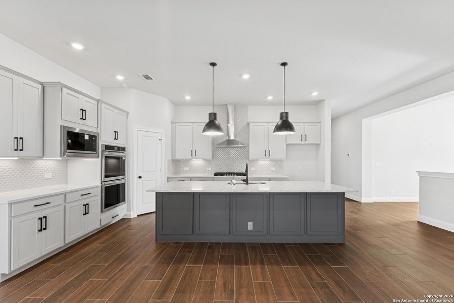 Furnished interior view inside a new home in Davis Ranch 60', San Antonio (Image 6).