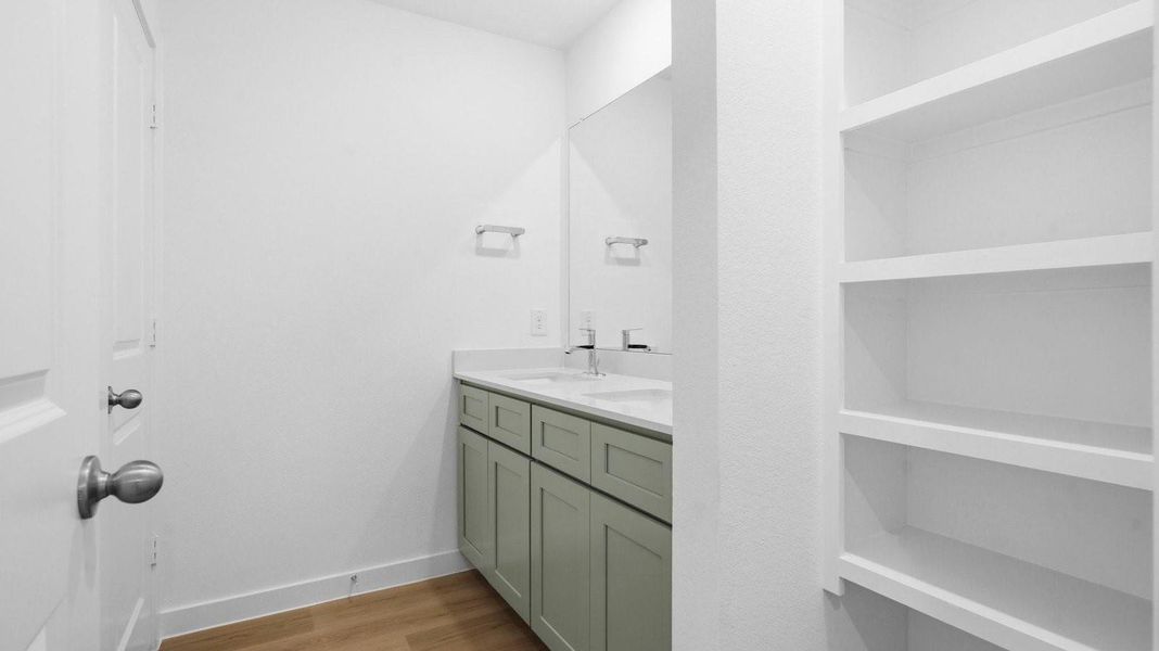 A well-designed bathroom equipped with granite countertops, a standing tub, and a single vanity. A well-designed bathroom equipped with granite countertops, a standing tub, and a single vanity.