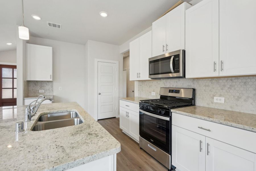 Photo is not of the actual home, but is an inspirational photo of builder’s model home and may depict options, furnishings, and/or decorator features that are not included