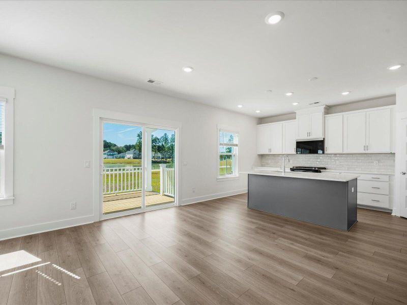 Spacious, unfurnished interior of a new home in The Coves at Lakes of Cane Bay II, Summerville (Image 27).