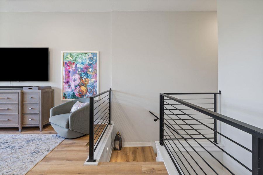 Upstairs landing. The black iron railings add a contemporary feel. Upstairs landing. The black iron railings add a contemporary feel.