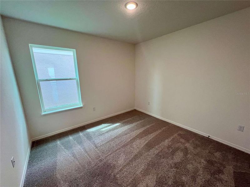 Spacious, unfurnished interior of a new home in Villamar, Winter Haven (Image 12).