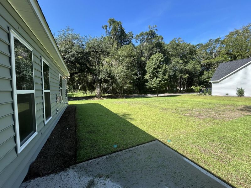 Front exterior of a new home in Academy Park, Beaufort, SC, highlighting curb appeal (Image 14). Front exterior of a new home in Academy Park, Beaufort, SC, highlighting curb appeal (Image 14).
