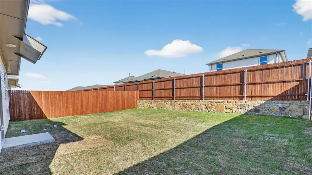 Exterior details and patio area of a home in Hickory Grove, Krum (Image 3). Exterior details and patio area of a home in Hickory Grove, Krum (Image 3).