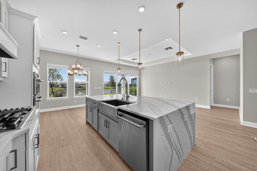 Furnished interior view inside a new home in Esplanade by the Islands, Naples (Image 8).
