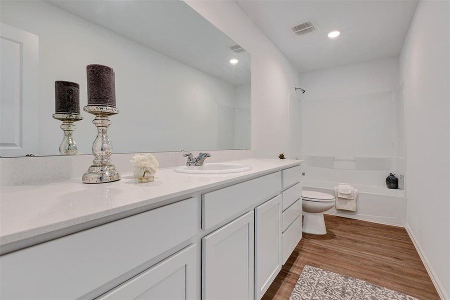 Primary ensuite bath with lots of counterspace.