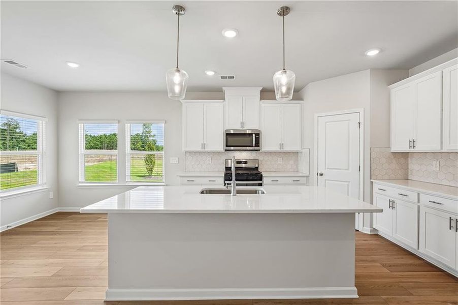 Furnished interior view inside a new home in Northwoods at Mirror Lake, Villa Rica (Image 6).
