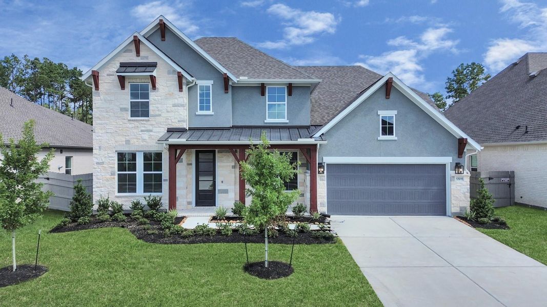 Front exterior of a new home in ARTAVIA: Hilltop Collection, Conroe, TX, highlighting curb appeal (Image 21). Front exterior of a new home in ARTAVIA: Hilltop Collection, Conroe, TX, highlighting curb appeal (Image 21).