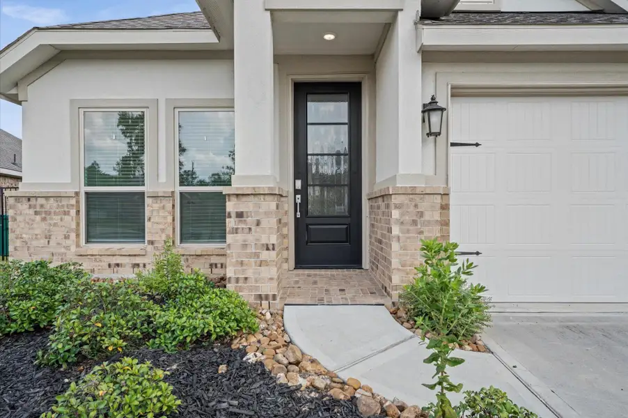Exterior details and patio area of a home in Kingwood-Royal Brook: Bristol Collection, Porter (Image 1). Exterior details and patio area of a home in Kingwood-Royal Brook: Bristol Collection, Porter (Image 1).
