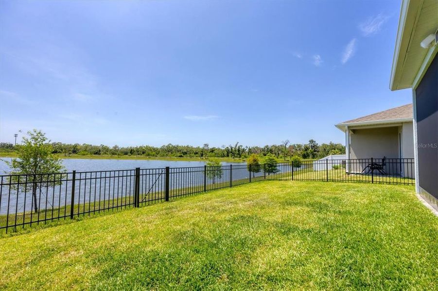 Front exterior of a new home in Avalon Woods, Lakewood Ranch, FL, highlighting curb appeal (Image 27). Front exterior of a new home in Avalon Woods, Lakewood Ranch, FL, highlighting curb appeal (Image 27).