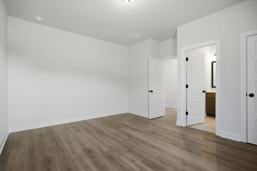 Spacious, unfurnished interior of a new home in Cherokee Knoll, Williamston (Image 29).