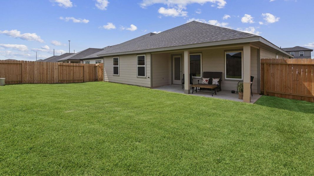 Exterior details and patio area of a home in Tamarron, Fulshear (Image 18).