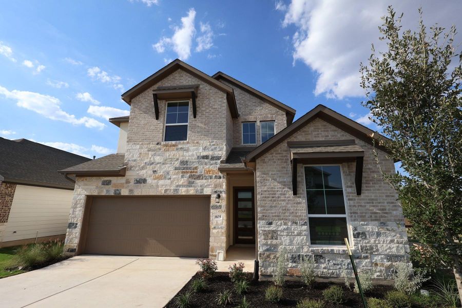 Front exterior of a new home in Arbor Collection At Park Central, Georgetown, TX, highlighting curb appeal (Image 1).