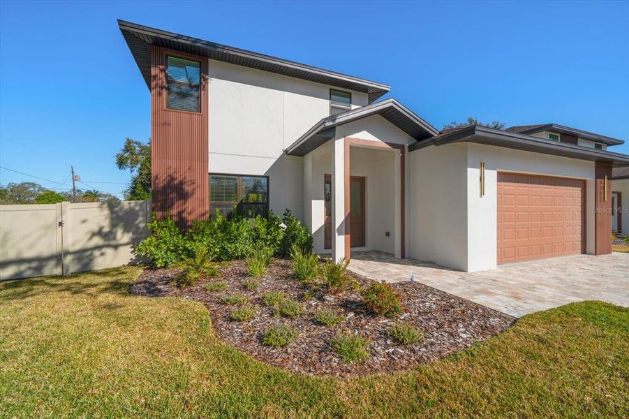 Front exterior of a new home in , Largo, FL, highlighting curb appeal (Image 28).