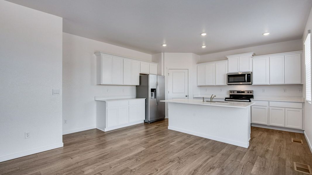 Furnished interior view inside a new home in Vista Meadows, Fort Lupton (Image 7).