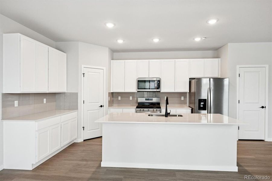 Furnished interior view inside a new home in Coyote Creek, Fort Lupton (Image 5).
