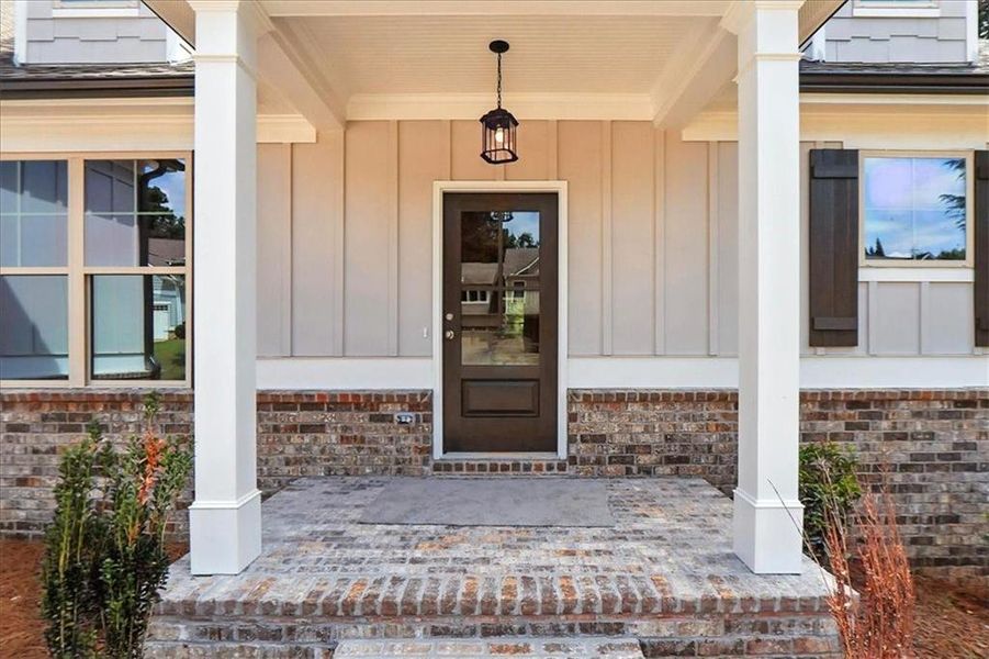 Exterior details and patio area of a home in Traditions of Braselton, Jefferson (Image 26).