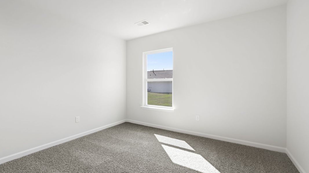 Spacious, unfurnished interior of a new home in Bentley Park, Greenwood (Image 22).