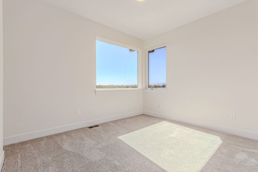 Spacious, unfurnished interior of a new home in West Grange, Longmont (Image 36).