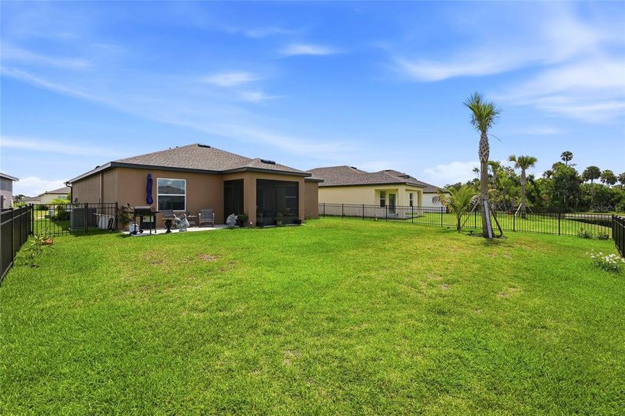 Exterior details and patio area of a home in Summerwoods, Parrish (Image 22).