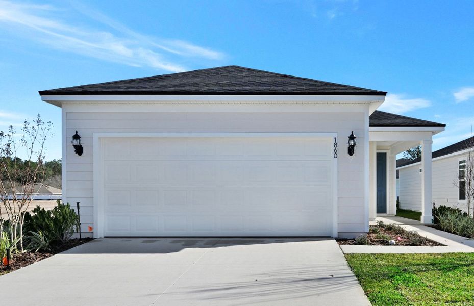 Front exterior of a new home in Murray Farms, Middleburg, FL, highlighting curb appeal (Image 18).
