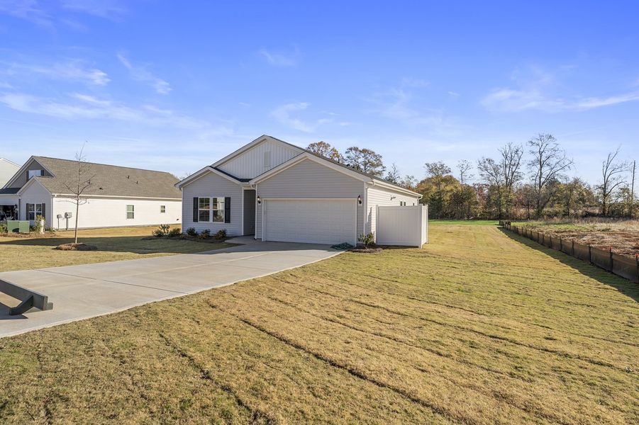 Front exterior of a new home in Burke Estates, Chesnee, SC, highlighting curb appeal (Image 2).