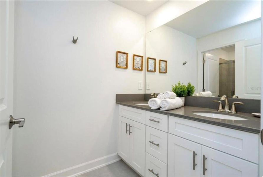 Furnished interior view inside a new home in , Kissimmee (Image 16). Furnished interior view inside a new home in , Kissimmee (Image 16).