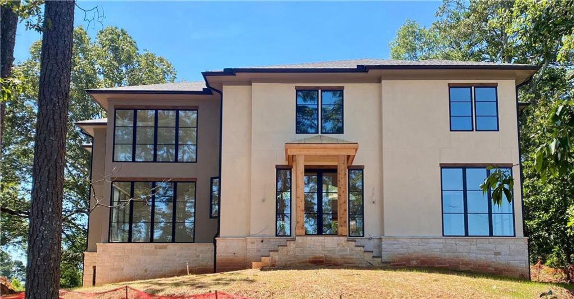 Front exterior of a new home in , Alpharetta, GA, highlighting curb appeal (Image 2).