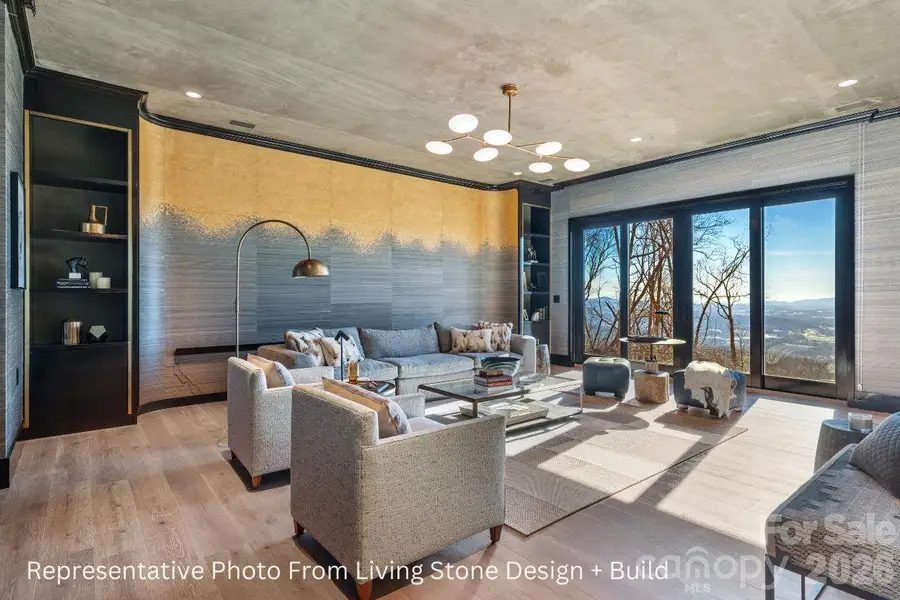 Lower level living. Representative photo from Living Stone Design + Build showing the craftsmanship, quality of construction and finish level. Final design, finishes, and details may vary. Lower level living. Representative photo from Living Stone Design + Build showing the craftsmanship, quality of construction and finish level. Final design, finishes, and details may vary.