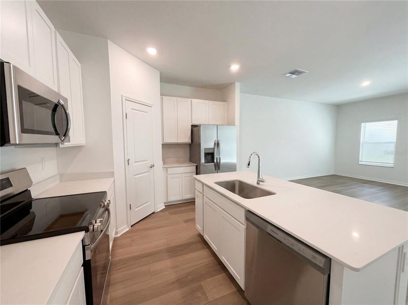Furnished interior view inside a new home in Grand Park, Dunnellon (Image 8).