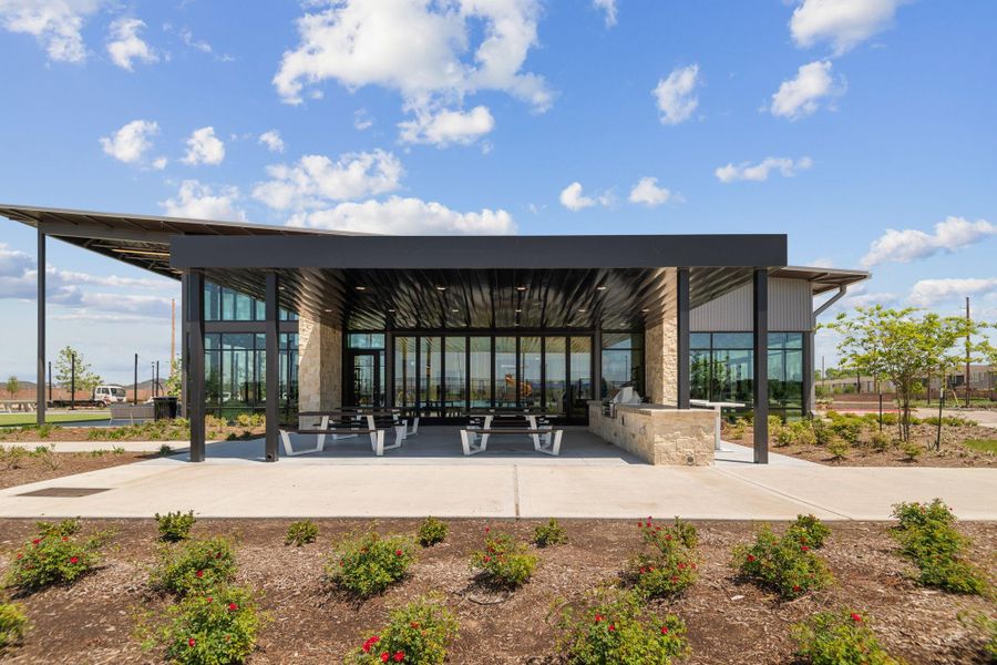 Front exterior of a new home in Sunterra, Katy, TX, highlighting curb appeal (Image 24). Front exterior of a new home in Sunterra, Katy, TX, highlighting curb appeal (Image 24).