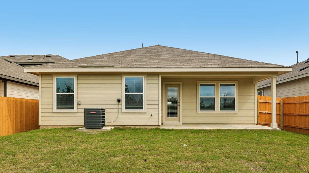 Exterior details and patio area of a home in Prairie Lakes, Buda (Image 2).