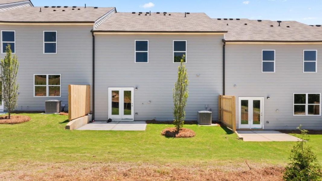 Exterior details and patio area of a home in Village at Pine Valley, Gainesville (Image 17).