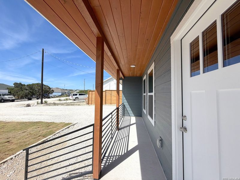 Exterior details and patio area of a home in , Spring Branch (Image 25).