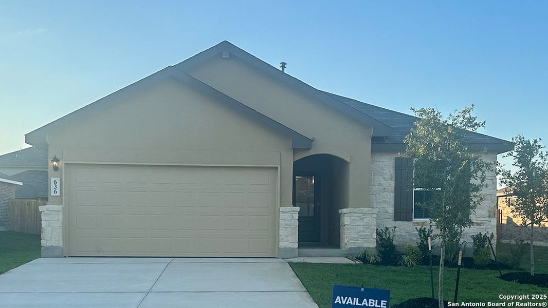 Front exterior of a new home in Steele Creek, Cibolo, TX, highlighting curb appeal (Image 2). Front exterior of a new home in Steele Creek, Cibolo, TX, highlighting curb appeal (Image 2).