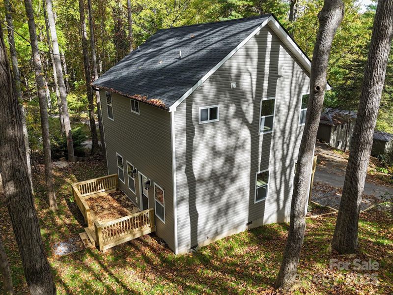 Front exterior of a new home in , Maggie Valley, NC, highlighting curb appeal (Image 1).