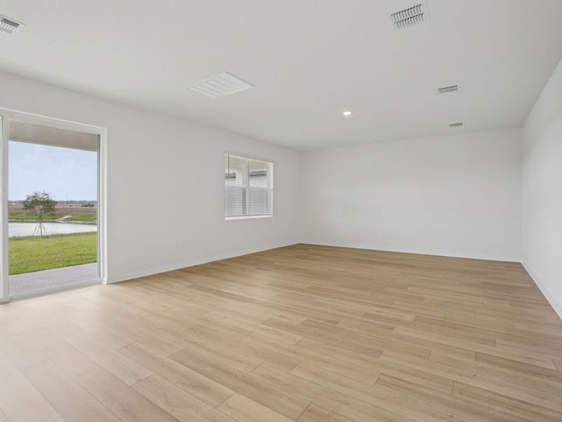 Spacious, unfurnished interior of a new home in Coasterra - Reserve Series, Palmetto (Image 13).