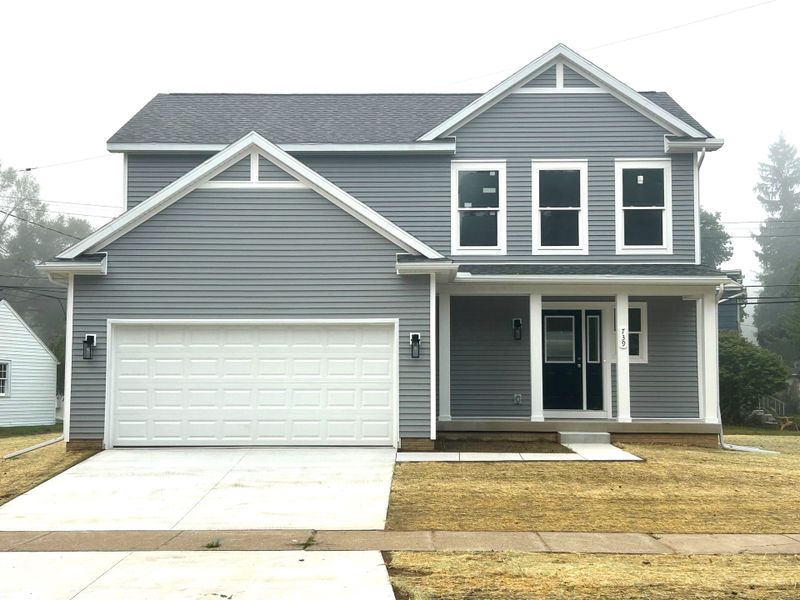Front exterior of a new home in Individual Homes - Jackson County, Jackson, MI, highlighting curb appeal (Image 2). Front exterior of a new home in Individual Homes - Jackson County, Jackson, MI, highlighting curb appeal (Image 2).