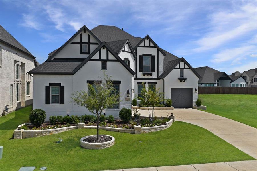 Front exterior of a new home in , Wylie, TX, highlighting curb appeal (Image 20).